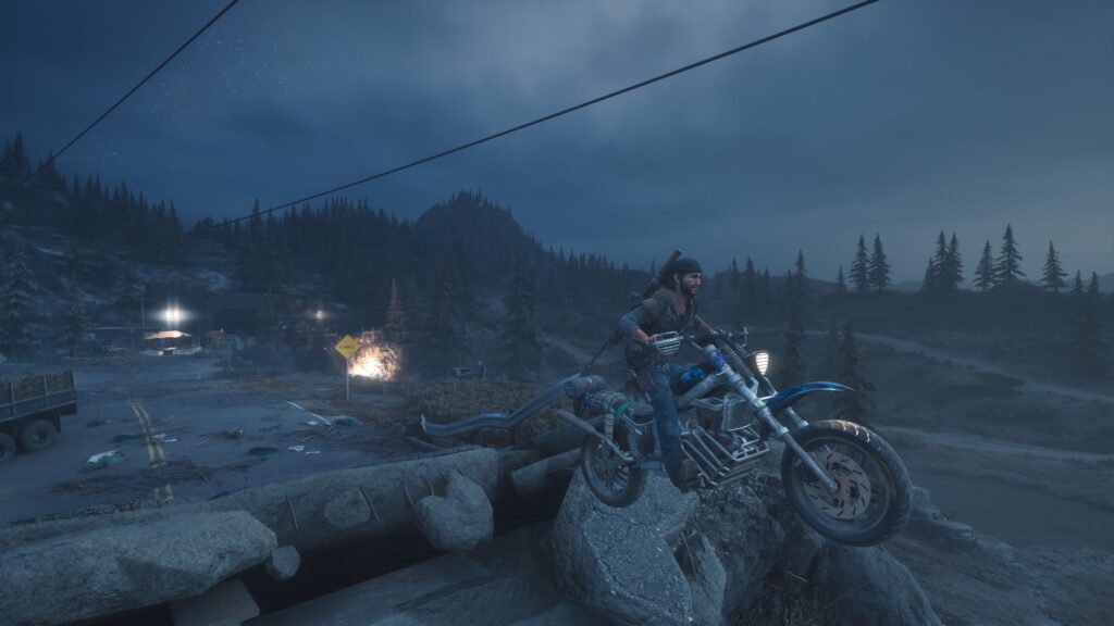Days Gone Remastered A man on a motorbike jumps off a broken bridge